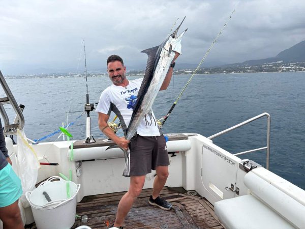 Big Game Trolling Victory: Successful Marlin Catch off Marbella